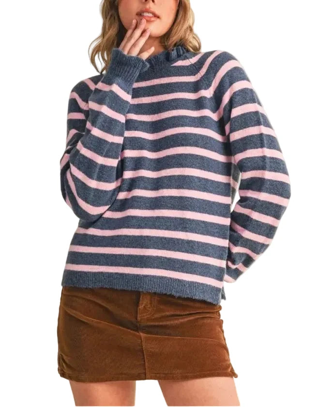 This ruffled striped sweater is all you need for an effortless feminine aesthetic! Soft sweater knit shapes this cute sweater that has a ruffled round neckline framed by raglan long sleeves that end with ruffled cuffs. The relaxed bodice features classic stripes and ends in a ribbed hem. Pair this darling sweater with jeans for a feminine and casual look!