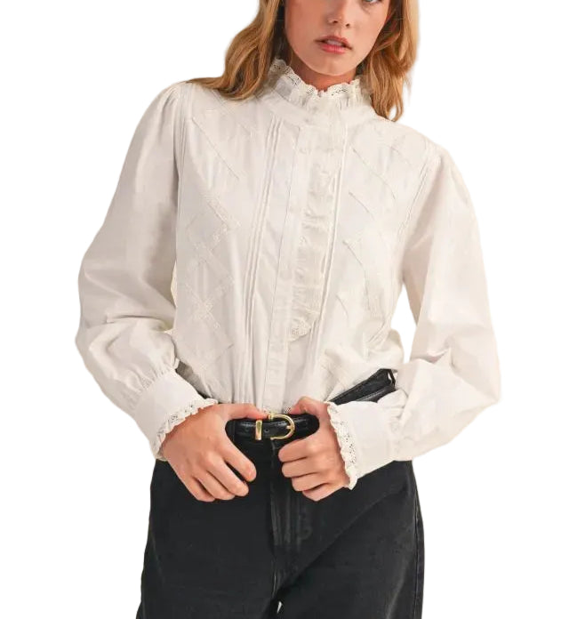 Elevate your wardrobe with this sophisticated high collar lace blouse in a timeless off-white shade. The delicate lace detailing adds an elegant touch, while the structured high collar creates a refined silhouette perfect for both professional settings and special occasions. Versatile and graceful, this piece pairs effortlessly with tailored trousers, skirts, or layered under jackets for a polished look year-round.