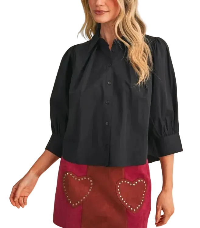 Add extra romance to your wardrobe with this puff sleeve button down top! Woven fabric shapes this top that has a collared neckline and button down placket. Voluminous puff sleeves end at a 3/4 length with wide buttoned cuffs. Pair these easy-to-style top with any of your favorite bottoms for a romantic look!