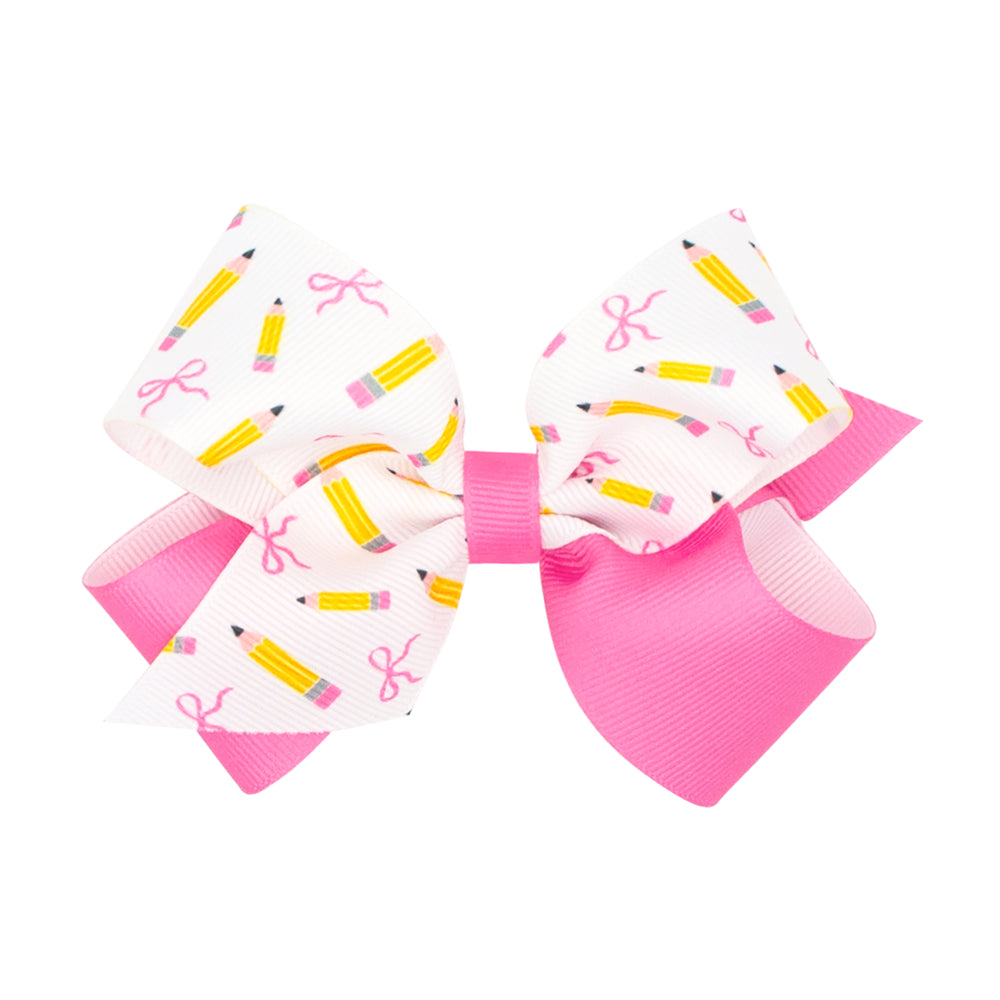 Large hair bow with pencil and bow pattern on a white background