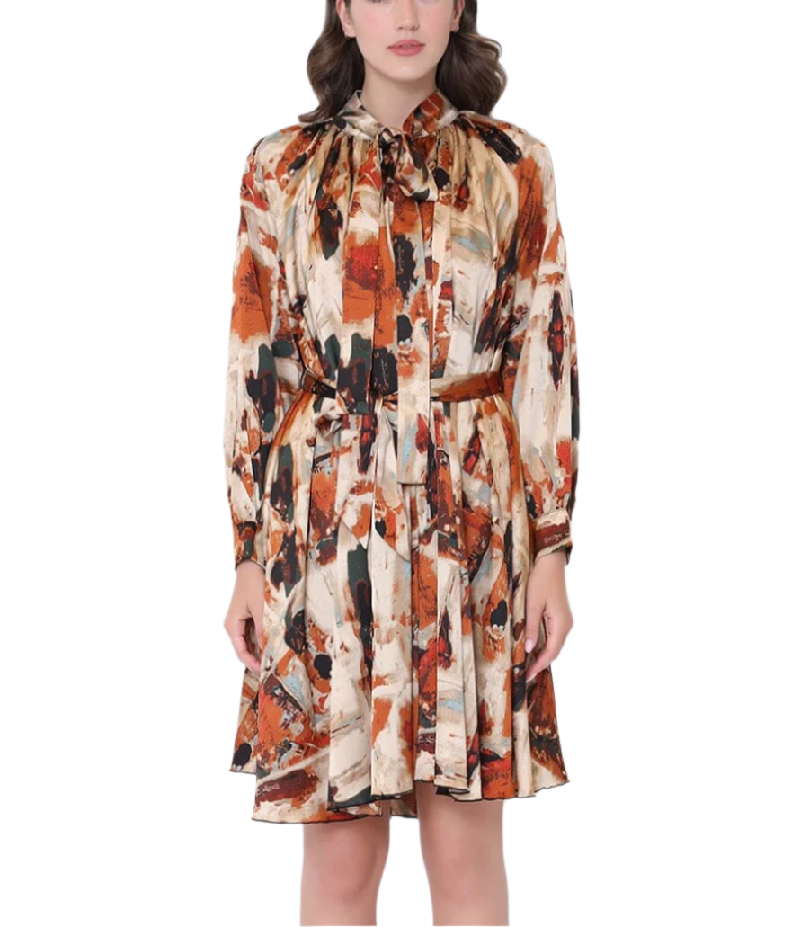 Step into effortless charm with this Satin Print Long Sleeve Dress. Featuring a playful tie neck and a flattering tie belt, it adds a touch of whimsy to your silhouette. The smooth satin fabric drapes beautifully, making it perfect for both day and night adventures.