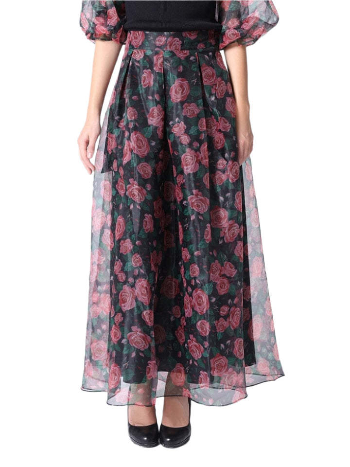 Float through your day with this sheer rose print long skirt in striking black and red. Its delicate fabric and vibrant floral design add a flirty touch to any outfit, perfect for twirling into the evening or brightening up a casual day.