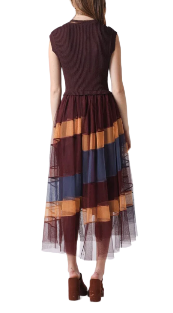 Step into a world of whimsy with this sleeveless long dress featuring a flowing tulle skirt in a rich burgundy hue. Its A-line silhouette flatters every figure, while the airy tulle adds a touch of playful elegance perfect for twirling the night away.
