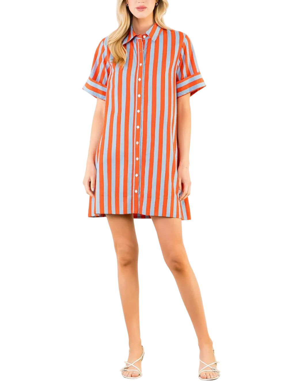 Woman wearing a striped shirt dress against a white background