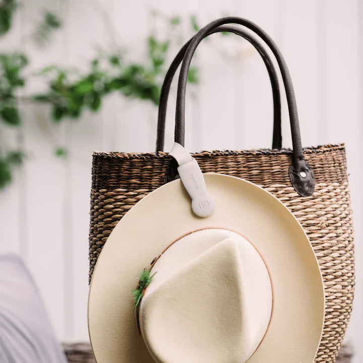 Meet the original Klipsta Hat Clip - a magnetic hat clip designed to carry your hat hands-free while you’re on the move.


The Hat Clip securely attaches to your bag, backpack or belt, allowing you to clip your hat by the brim and keep it close without wearing it. It’s designed for everyday use and works with a wide range of hats, including sun hats, Akubras, kids’ hats, beach hats and caps.


With its clever locking loop and magnetic closure, the Klipsta Hat Clip is easy to attach, remove and reattach as n