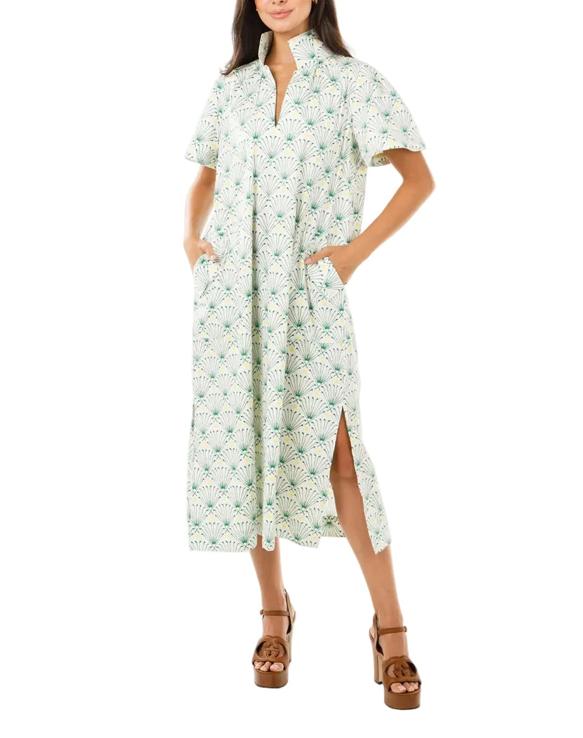 Meet our friend Gretchen!  If you love the easy wear of Catherine you will LOVE her just as much!  Our signature stand collar, front button pockets, softly pleated sleeves, bamboo ring belt and stunning side slits make this the PERFECT dress!